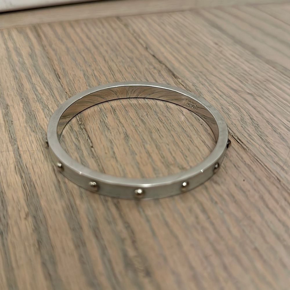 Coach silver bracelet with silver enamel and silver studs